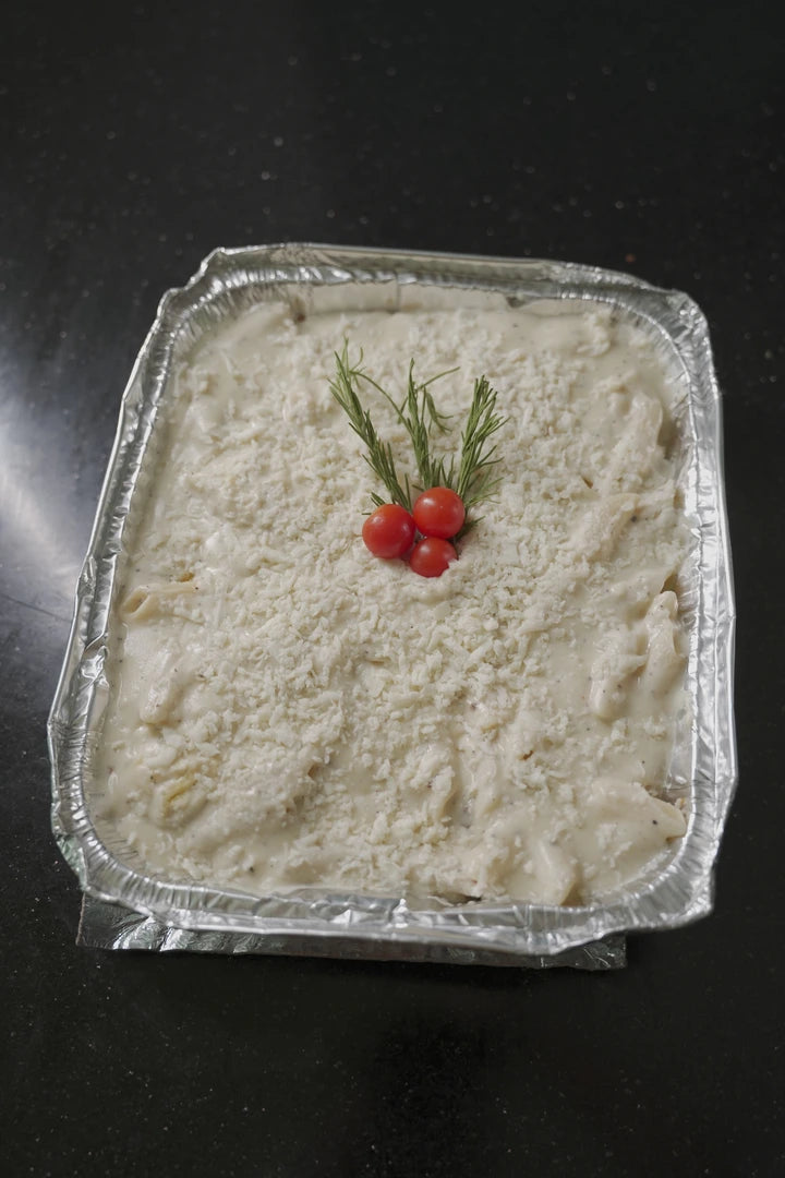 صنيه مكرونه بشاميل لحمه وسط